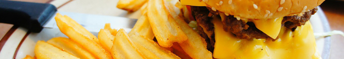 Eating Burger at Backstreet Bar & Grill restaurant in Longview, TX.